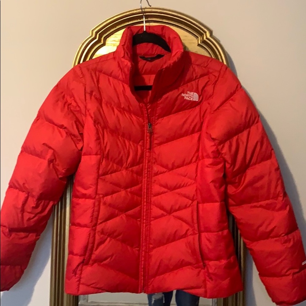 Northface woman’s  puffer. Color Poppy